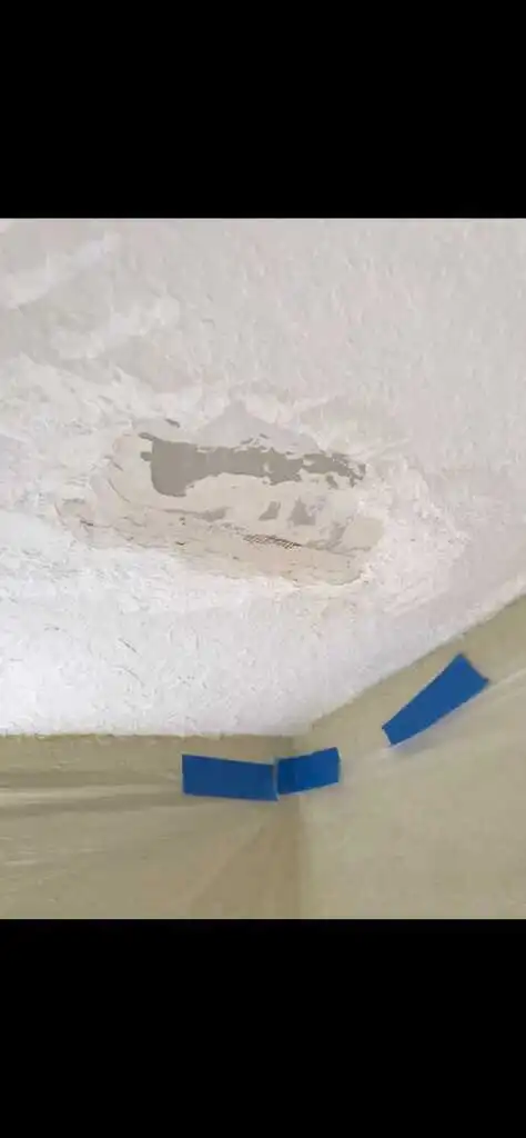 Ceiling surface before water damage repair